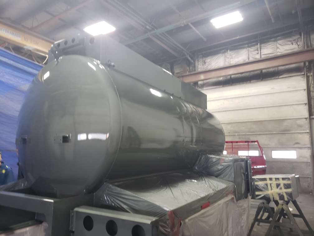 A fluid tank after top coating